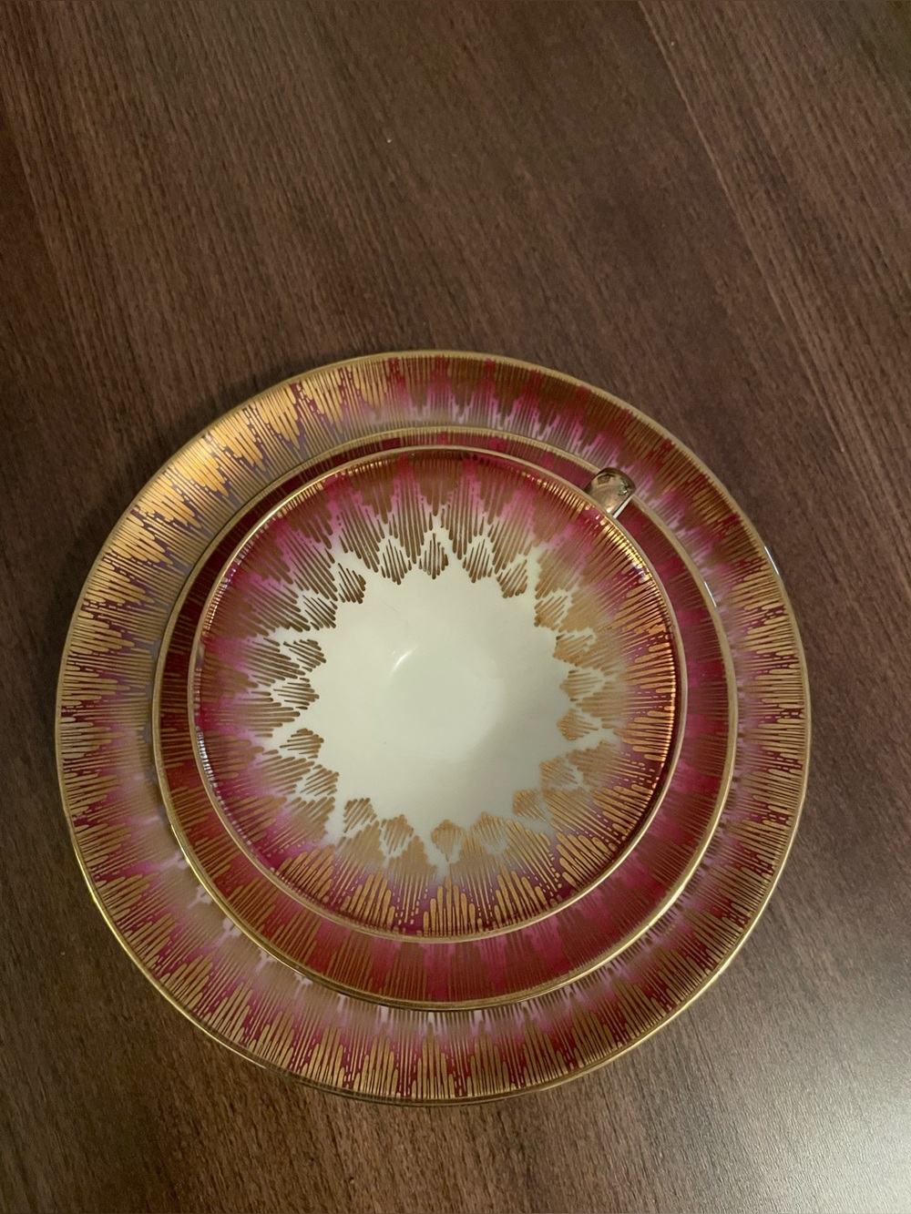 Porcelain Tea Cup and Trio with Burgundy and Gold Radiant Border